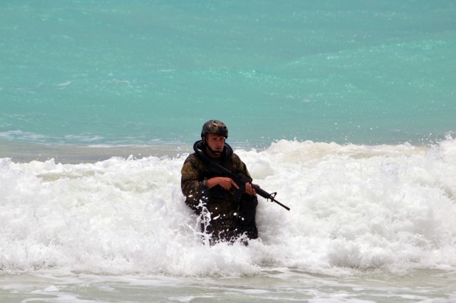 Soldiers, Marines conduct helocast operations off Hawaiian coast