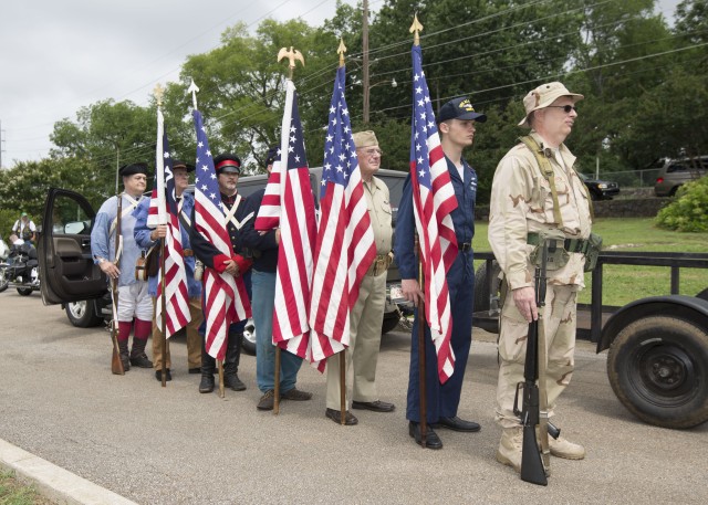 Community pauses to honor heroes