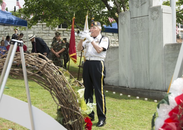 Community pauses to honor fallen heroes