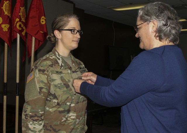 Separated military family comes together for promotion