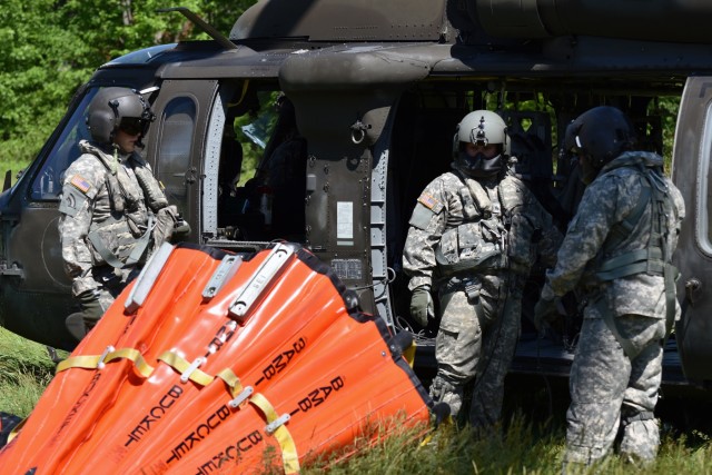 New York Army Guard helicopter crews hone water bucket firefighting skills