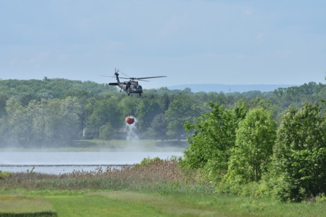 New York Army Guard helicopter crews hone water bucket firefighting skills