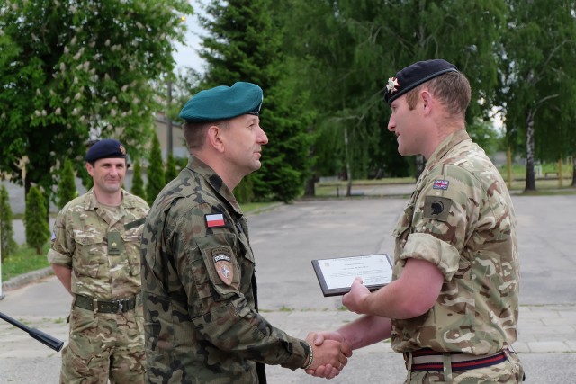 Battle Group Poland's Light Dragoons engage in a different type of fire fight