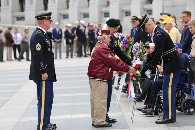 BOSS leaders place wreath at WWII memorial