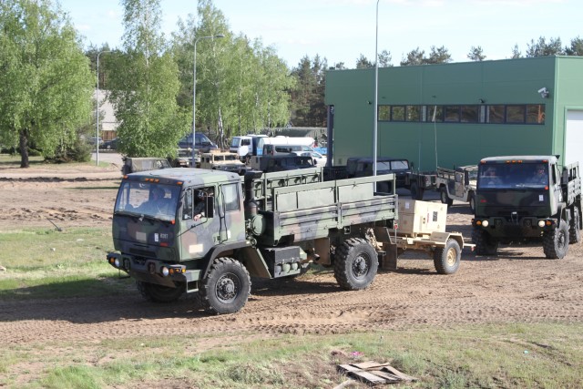 US Soldiers delivering equipment for Saber Strike Exercise