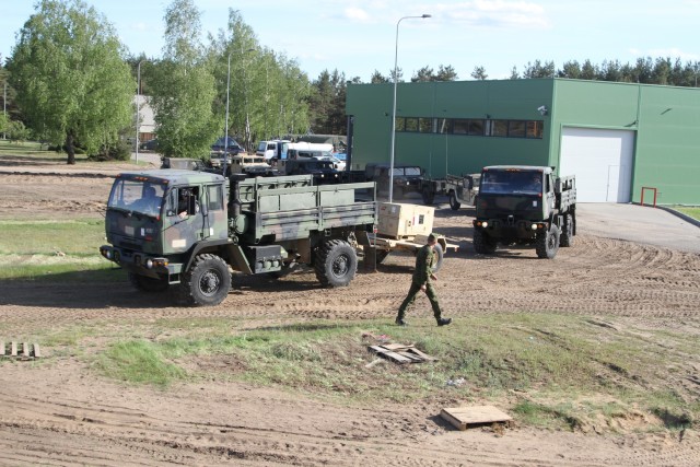 US Soldiers delivering equipment for Saber Strike Exercise