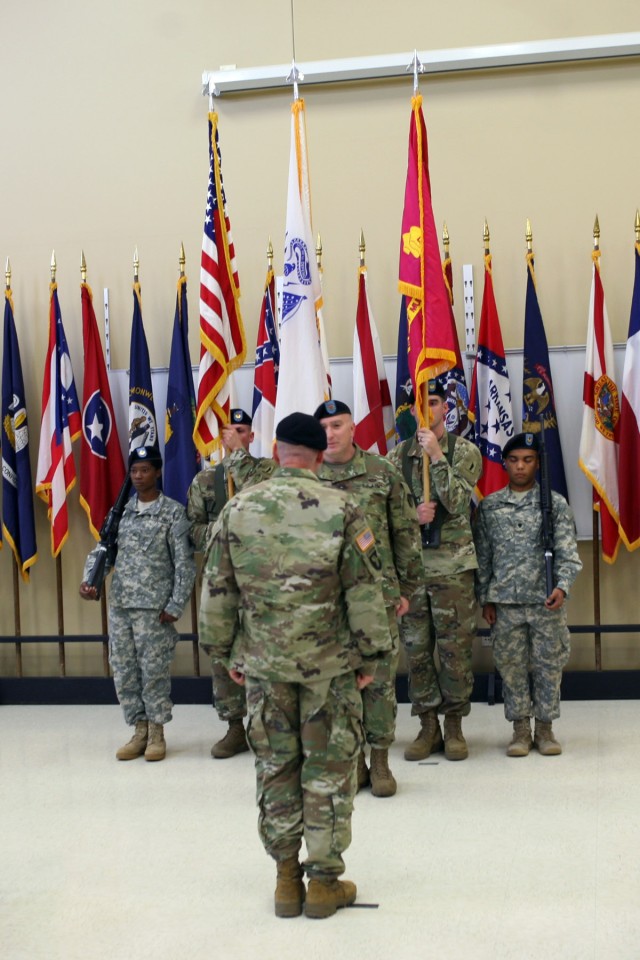 LTC Jeffrey Ignatowski and Command Sgt. Maj. Richard Huff Jr. prepare for the retirement of the colors during the Letterkenny Munitions Center Change of Command Ceremony, June 6.