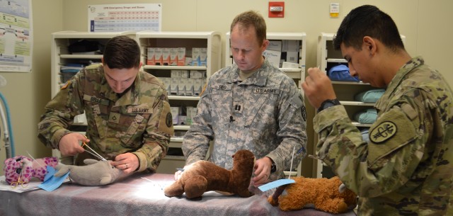 Fort Carson veterinarians fix beloved toys with Teddy Bear Clinic