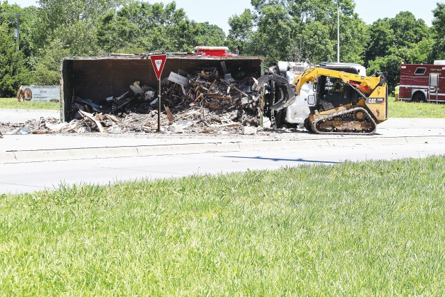 Assets from Fort Riley, Kansas USAG helped remove debris and a truck mishap from post traffic circle and roadway June 2.
