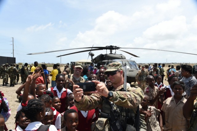 'From the screen to real life': National Guard, sister services conduct community outreach during Tradewinds 2017
