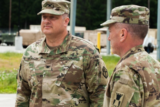 Col. William R. Morgan Jr. stands at attention