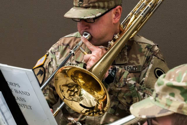 A Soldier with the America's Corps Band plays through a rendition of The Army Song