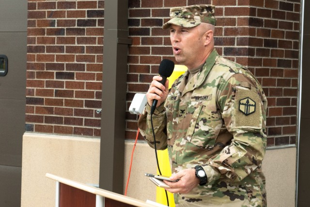 Col. Michael D. Lewis addresses Soldiers, friends and family members of the 301st Maneuver Enhancement Brigade
