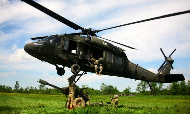 New York Army Guard aviators and artillerymen team up for joint training at Fort Drum