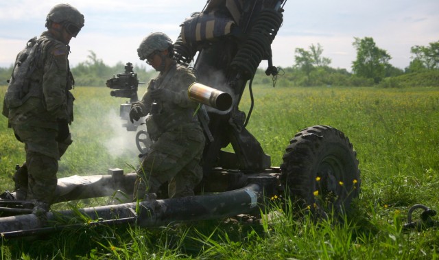 New York Army Guard aviators and artillerymen team up for joint training at Fort Drum