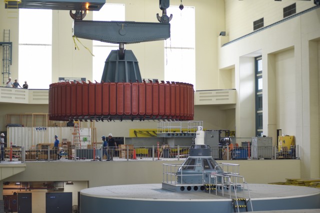 Crew installs 249-ton hydropower rotor at Center Hill Dam