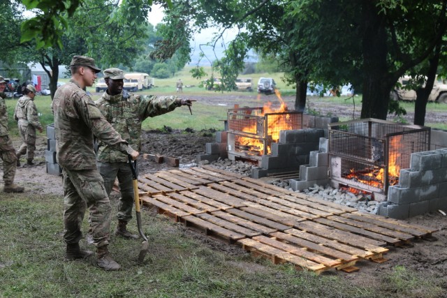 3/4 ABCT brings taste of America to Romania with 4th of July pig roast