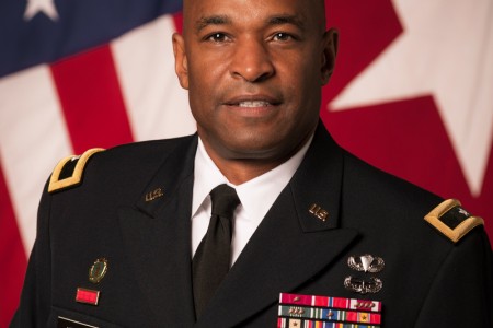 Brig. Gen. Kevin Vereen, deputy commanding general operations for U.S. Army  Recruiting Command, gives the Oath of Enlistment Nov. 12 to nearly 100  Future Soldiers during halftime of the Washington Redskins' Salute