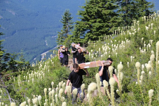 Special Forces Soldiers carry the load for the Forestry Service