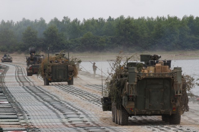 US, Romanian forces build bridge at Bordusani