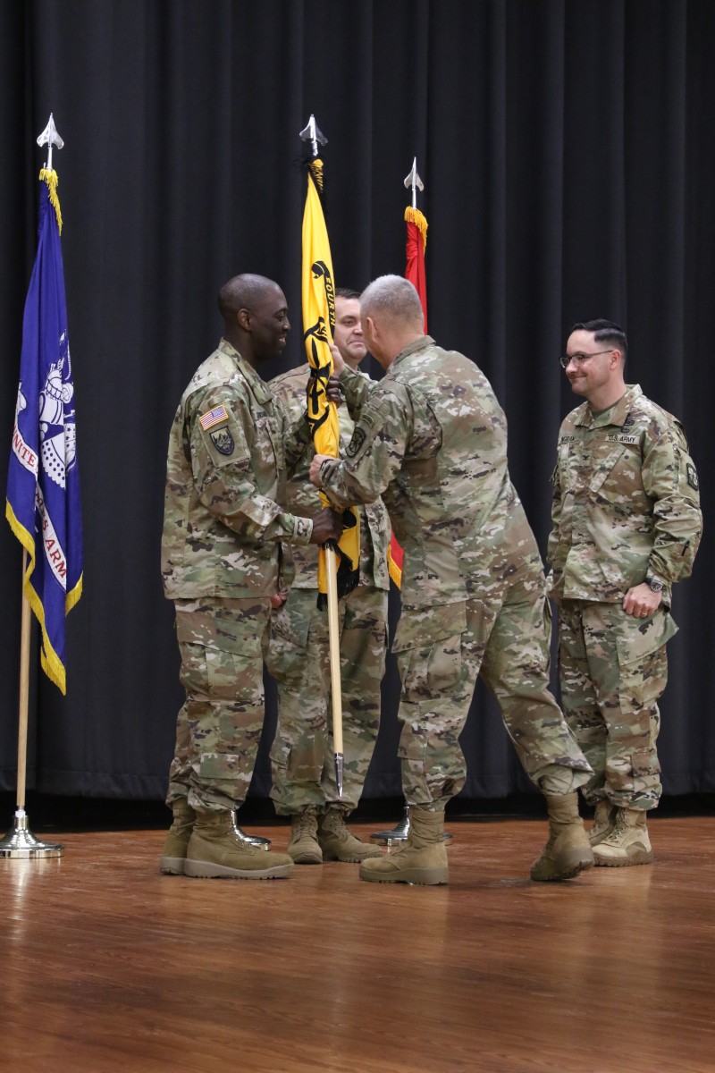 Ingram passes colors to Duncombe during Cadet Command 4th Brigade ...