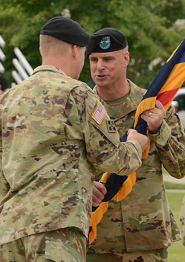 CIMT CG, MG Frost accepts CIMT colors from TRADOC CG, GEN Perkins