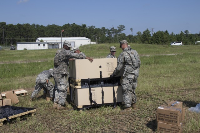 Troops sling load supplies to keep comrades in fight