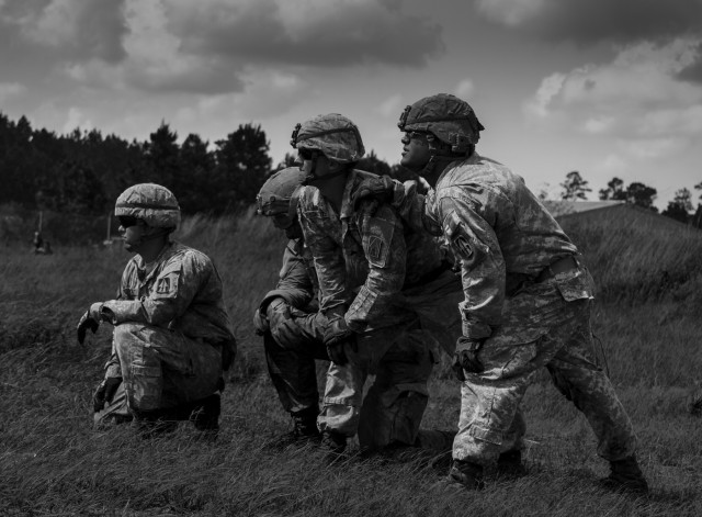 Troops sling load supplies to keep comrades in fight