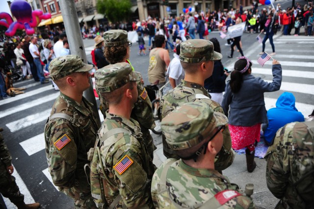 Service Members march in Monterey's Independence Day parade