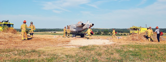 First responders from Fort Riley, Kansas and environs came together for simulated plane crash and search training July 19.
