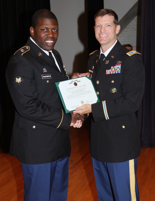 Spc. Washington, 781st MI Battalion, was the TDQC distinguished honor graduate