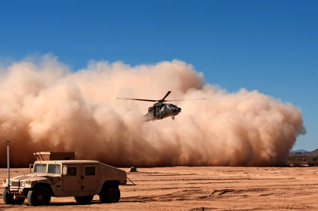 Test pilots conduct sensor testing in brownout conditions