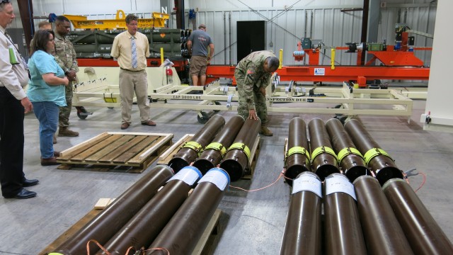 Lt. Gen. Piggee inspects MLRS rocket motors, post de-mating operations at Letterkenny Munitions Center.