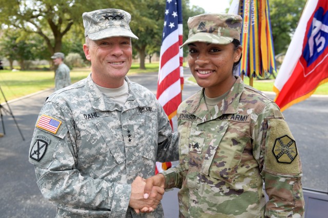 IMCOM Commander Lt. Gen. Kenneth Dahl and Fort Gordon Best Warrior Competitor Sgt. Kayanna Johnson
