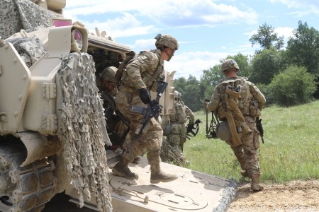 Two snipers of the 68th Armour Regiment's 1st Battalion are pictured with  their M107 Long Range