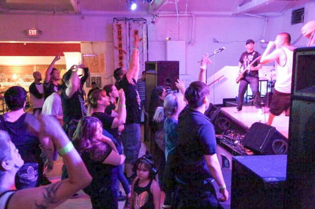 Audience members dance and sing at the IPO Radio Festival