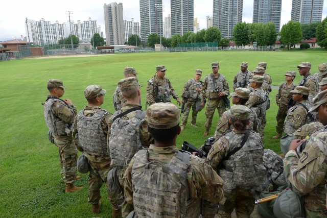 Capt. Andres Gil, HHD Commander briefs the soldiers before the 'bird ride'