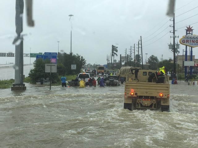 Army Reserve Soldiers helping to rescue residents from Houston's flood waters