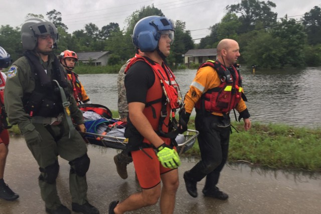 Hybrid team rescues handicapped man from Hurricane Harvey flooding with water, ground and air assets