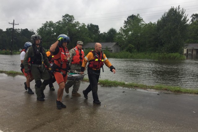 Hybrid team rescues handicapped man from Hurricane Harvey flooding with water, ground and air assets