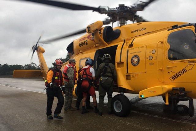 Hybrid team rescues handicapped man from Hurricane Harvey flooding with water, ground and air assets