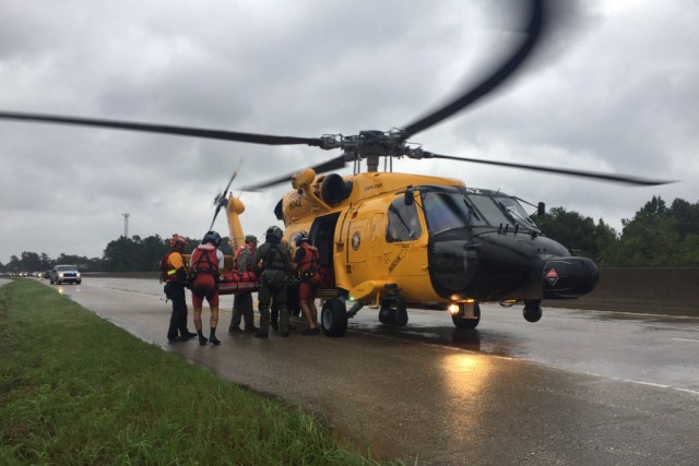 Hybrid team rescues handicapped man from Hurricane Harvey flooding with water, ground and air assets
