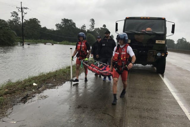 Hybrid team rescues handicapped man from Hurricane Harvey flooding with water, ground and air assets