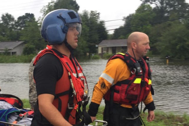 Hybrid team rescues handicapped man from Hurricane Harvey flooding with water, ground and air assets
