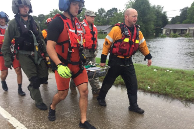 Hybrid team rescues handicapped man from Hurricane Harvey flooding with water, ground and air assets