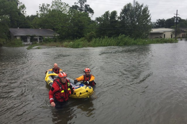 Hybrid team rescues handicapped man from Hurricane Harvey flooding with water, ground and air assets