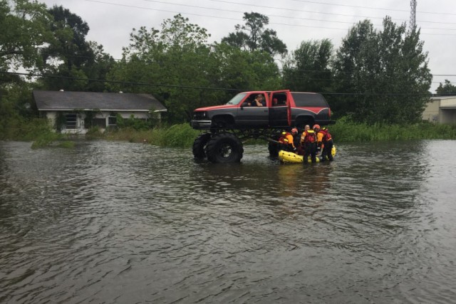 Hybrid team rescues handicapped man from Hurricane Harvey flooding with water, ground and air assets