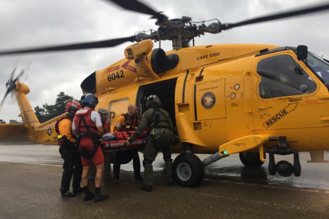 Hybrid team rescues handicapped man from Hurricane Harvey flooding with water, ground and air assets