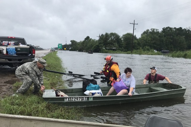 Hybrid team rescues handicapped man from Hurricane Harvey flooding with water, ground and air assets