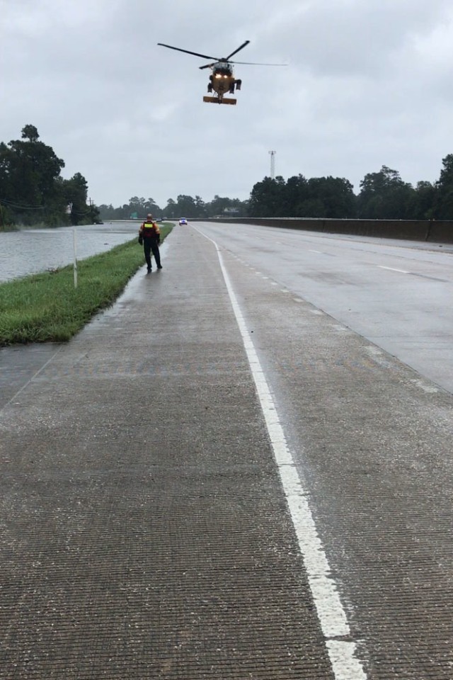 Hybrid team rescues handicapped man from Hurricane Harvey flooding with water, ground and air assets